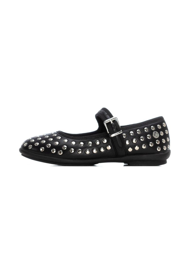 Scarpe Mary Jane nere con suola piatta, caratterizzate da borchie metalliche disposte in un motivo sulla parte anteriore e una fibbia per una vestibilità sicura.