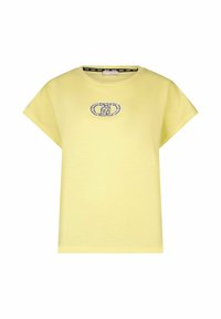 T-shirt jaune à manches courtes avec un col rond et un logo ovale central orné de bijoux sur la poitrine.
