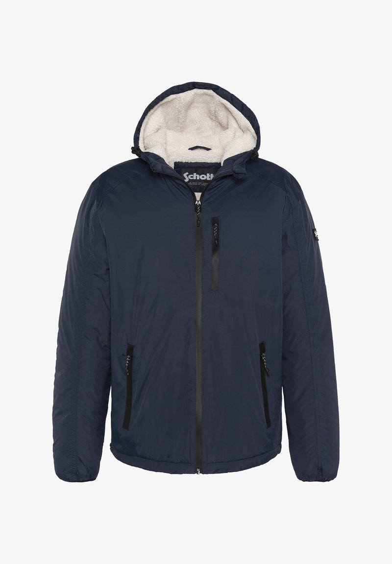 Marineblå puffjakke med hætte, der har en blød fleecefor, frontlynlås og to lynlåslommer på siden. Elastiske manchetter og kant.