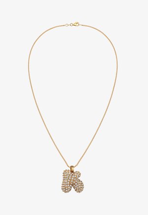 Goldkette mit einem Anhänger in Form des Buchstabens "K", besetzt mit klaren Strasssteinen und einer glatten, polierten Oberfläche.