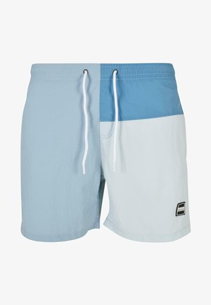 Costumi da bagno azzurro chiaro con un design bicolore, vita elasticizzata con cordino e una piccola toppa con il marchio sul lato inferiore destro.