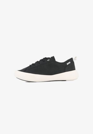 Black canvas sneakers with a white rubber sole, round toe, lace-up design, and a small brand tag on the side. Smooth texture.