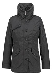 Svart, lätt jacka med hög krage, dragkedjestängning, sex framknappar och två snedställda fickor. Tillverkad av ett slätt, slitstarkt tyg.