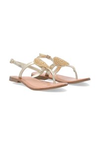 Guld flade sandaler med ankelremme, prydet med cirkulære perle- og rhinestone-detaljer. Glat beige indersål og flad brun ydersål.
