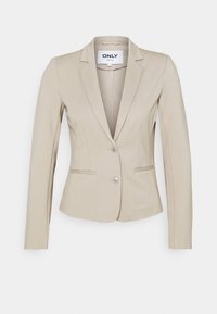 Beige Blazer mit langen Ärmeln, Reverskragen, Ein-Knopf-Verschluss und zwei vorderen Taschen; aus glattem Stoff mit taillierter Passform.