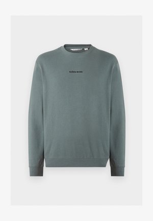 Olivno zelena dolgoročna majica z okroglim ovratnikom, na sredini prsi z napisom "BJÖRN BORG", z rebrastimi manšetami in robom.