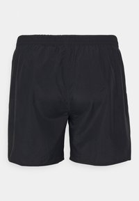 Svarte svømmeshorts med elastisk midje og glatt tekstur, med et enkelt design uten synlige mønstre eller detaljer.