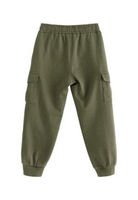 Olijf groene sweatpants met een elastische tailleband, boorden aan de enkels en twee zijvakjes voor extra functionaliteit. Zachte stofstructuur.