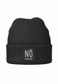 Black knitted beanie with a textured ribbed design, featuring a fabric label with the text “NÖ” and “Einfach NÖ” in white.