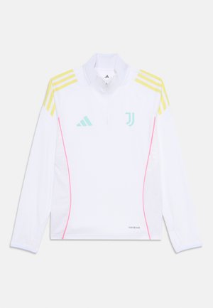 Jersey à manches longues blanc avec des rayures jaunes sur les épaules, des accents latéraux roses et des logos bleu clair. Fabriqué en tissu léger et respirant.