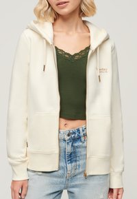 Superdry & Co ESSENTIAL mleczny