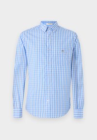 Blå og hvit rutete skjorte med lange ermer, krage og brystlomme. Stoffet ser glatt og lett ut.
