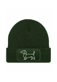 Green knit beanie with a folded cuff featuring a white embroidered dachshund design on a rectangular patch. Soft texture, ribbed pattern.