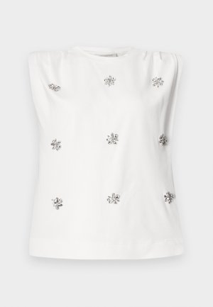 Top branco sem mangas com decote redondo, apresentando aplicações prateadas que lembram flores, dispostas uniformemente sobre o tecido. Textura suave.