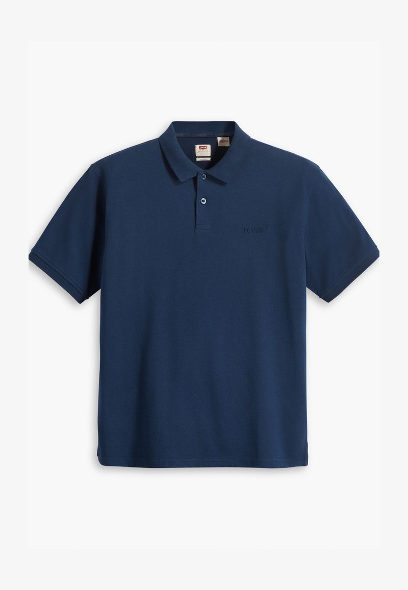 Polo bleu marine en tissu coton doux, avec un col classique, deux boutons et un logo Levi's subtilement brodé sur la poitrine.