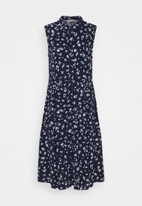 Navy bloemenprint jurk, mouwloos met een kraag, voorzien van witte bloemen, geplooide rok en knoopsluiting aan de voorkant.