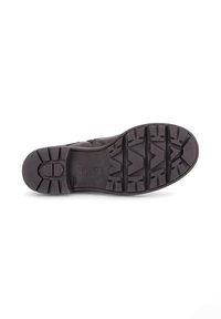 Zwarte rubberen sneakerzool met multidirectionele looppatronen, voorzien van een gladde textuur en reliëfbranding op de hak.