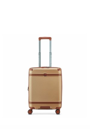 Valigia rigida compatta color oro con dettagli marroni, quattro ruote girevoli e manico telescopico esteso.