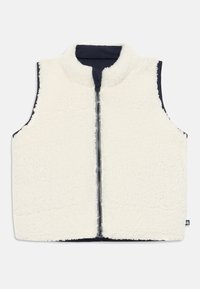Fleeceväst med hög krage, krämfärg, dragkedjestängning fram, och marinblå accenter längs sidorna och nederkanten. Mjuk textur.