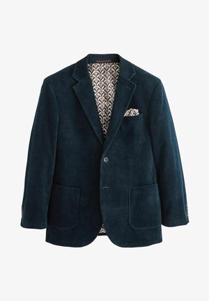 Blazer en velours côtelé bleu marine avec un col cranté, deux poches avant et une doublure brune à motifs. Comprend un pochette dans la poche de poitrine.