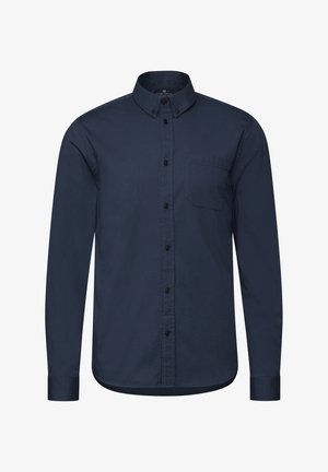 Chemise à manches longues bleu marine en coton avec un col boutonné, une poche poitrine simple et un ourlet arrondi. Boutons noirs.