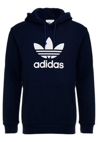 Mörkblå Adidas huvtröja med vit trefoil-logotyp och "adidas" text på framsidan, känguruficka och justerbar dragsko på huvan.