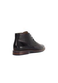 Black leather ankle boot with rounded toe, minimal stitching, brown wooden sole accents, and lace-up detail. Smooth texture and sleek design.