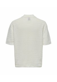 White knitted short-sleeve polo shirt with a textured pattern and banded collar. Features a straight hem and a relaxed fit.
