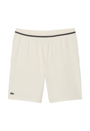 Crème-kleurige shorts met een geweven zwarte tailleband, voorzien van een groen krokodillologo op het linkerbeen en zijzakken. Gemaakt van lichtgewicht stof.