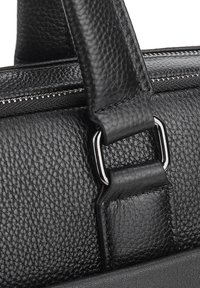 Black textured leather handbag with a zip closure, featuring silver-tone hardware and reinforced straps for added durability.