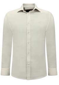 Licht beige lange mouwen shirt gemaakt van textuurstof. Kenmerkt zich door een klassieke kraag, knoopsluiting aan de voorkant en enkelvoudige knopen bij de mouwen. Subtiele logo op de borst.