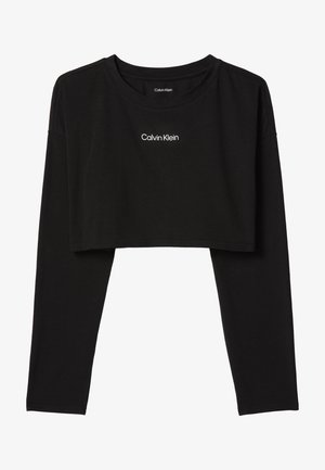 Zwart cropped shirt met lange mouwen, ronde hals en wit "Calvin Klein"-logo centraal op de borst.