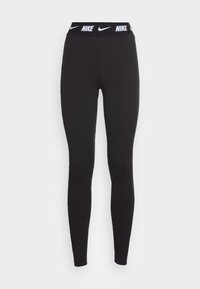 Svarta leggings gjorda av elastisk tyg med hög midja som har en vit Nike-logga. Designen är figurnära med en slät yta.