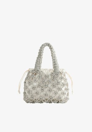 White fabric handbag wrapped in silver beaded netting with braided handle and drawstring closure on both sides.