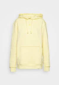 Žlutá bavlněná mikina s kapucí se šňůrkou, přední kapsou, žebrovanými manžetami a lemem, s malým logem na hrudi.