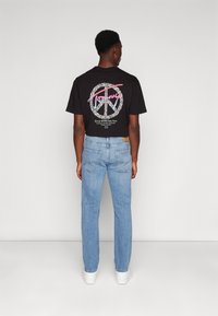 Tommy Jeans GRAPHIC TEE - Camiseta estampada - black