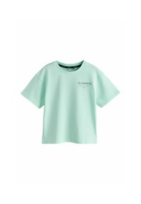 Mintgrøn T-shirt med korte ærmer i bomuld, med rund hals og lille trykt logo foran, afslappet pasform.