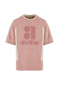 Pink oversized short-sleeve t-shirt with a suede-like texture. Features contrasting cream side panels and a large printed design in the center.