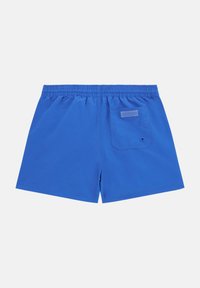 Pantaloni da bagno blu con cintura regolabile, elastico sul retro e tasca posteriore con patch del marchio. Tessuto morbido.