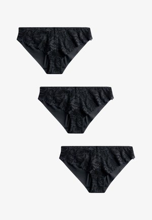 Tres piezas de ropa interior tipo bikini para mujer de encaje negro con patrones florales, mostradas sobre un fondo blanco en una disposición vertical.
