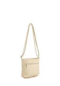 Lichtbeige leren crossbodytas met een gestructureerde afwerking, rechthoekige vorm, verstelbare schouderband en een voorvak met rits.