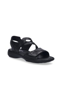 Černé kožené sandály s nastavitelnými křížovými popruhy, otevřenou špičkou, polstrovanou stélkou a nízkým klínovým podpatkem pro pohodlí a podporu.