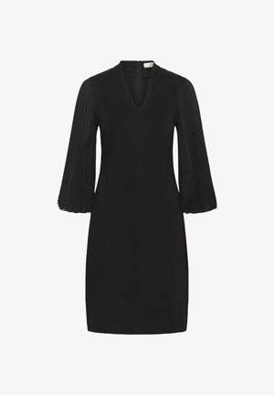 Robe noire avec un décolleté en V, un corsage ajusté et des manches plissées transparentes évasées. Texture lisse, design longueur genoux avec une fermeture éclair au dos.