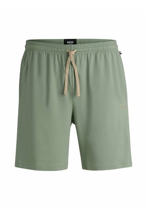 Lysegrønne shorts lavet af blødt stof, med elastisk talje og beige snøre samt et lille broderet logo på benet.