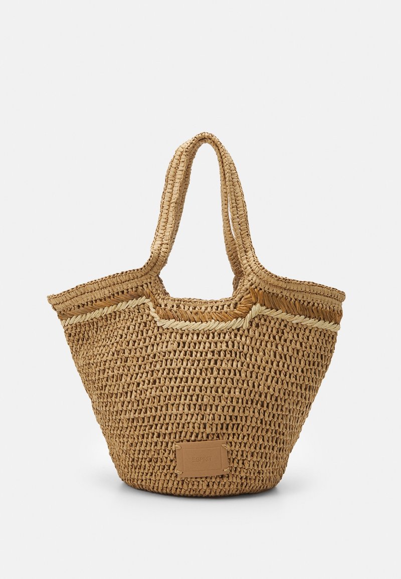 Geflochtener Strohtasche in natürlichem Beige, mit zwei Griffen und einer dekorativen hellen Einfassung. Enthält ein Leder-Logopatch.