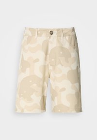 Beige shorts with a cream camouflage pattern, featuring a button closure, belt loops, and pockets. Made from fabric with a smooth texture.