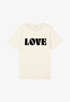T-shirt en coton crème à manches courtes et col rond, avec le mot "LOVE" en lettres noires audacieuses sur le devant.