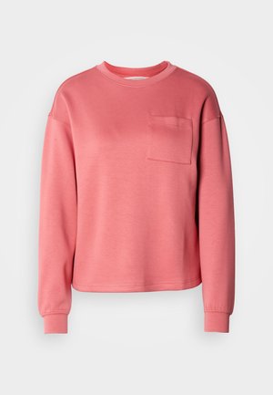 Sweatshirt corail rose à manches longues avec col rond, poche poitrine et poignets côtelés sur un fond uni.