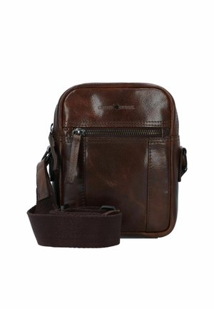 Sac bandoulière en cuir marron de forme rectangulaire, avec une poche zippée à l'avant et une bandoulière en tissu. Texture lisse, quincaillerie minimale.