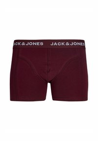 Boxer elasticizzati color bordeaux realizzati in morbido cotone. Presentano un cinturino elastico con il logo "JACK & JONES" in bianco e un design con tasca sagomata.